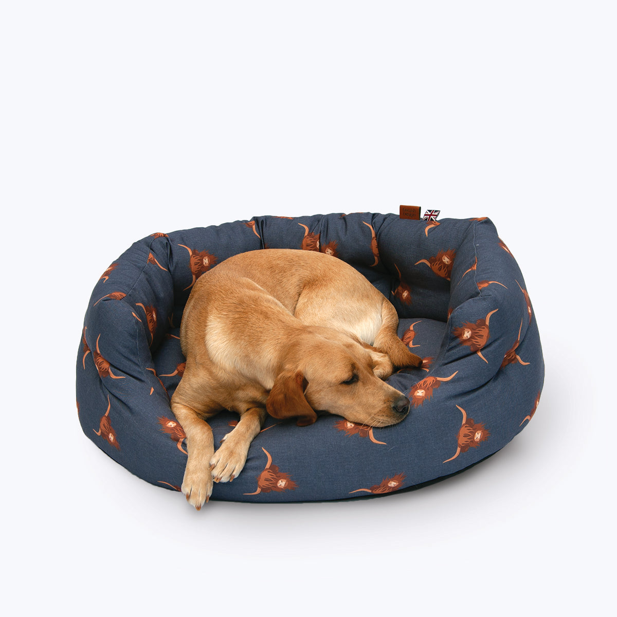 Danish Design Bramblehorn Deluxe Slumber Dog Bed with Dog in a Highland Cow Design fabric