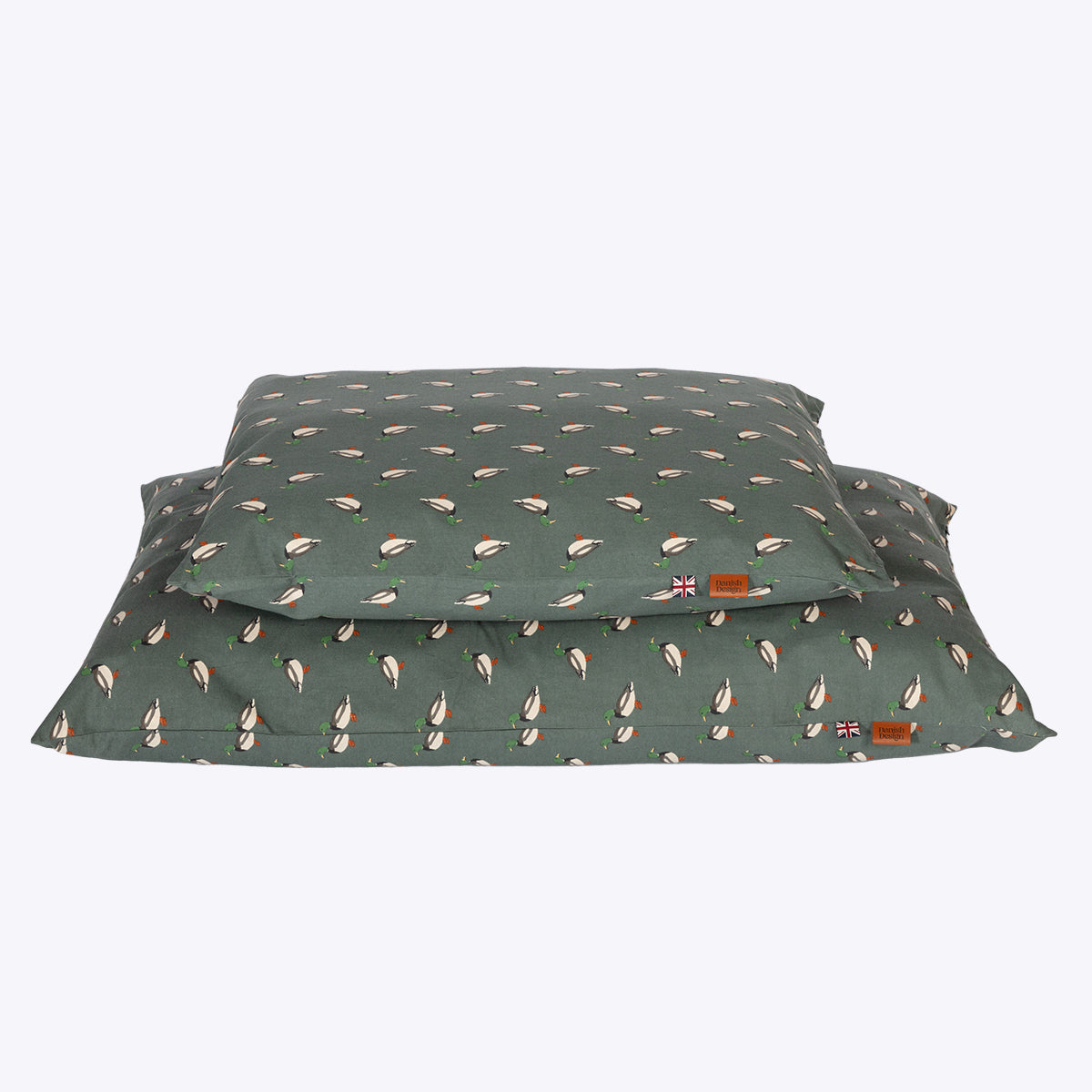 Danish Design Puddlewick Deep Duvet Dog Bed featuring a duck print design on a smoky green background showing the medium and large bed in a stack