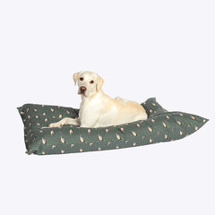Danish Design Puddlewick Deep Duvet Dog Bed featuring a duck print design on a smoky green background with golden labrador