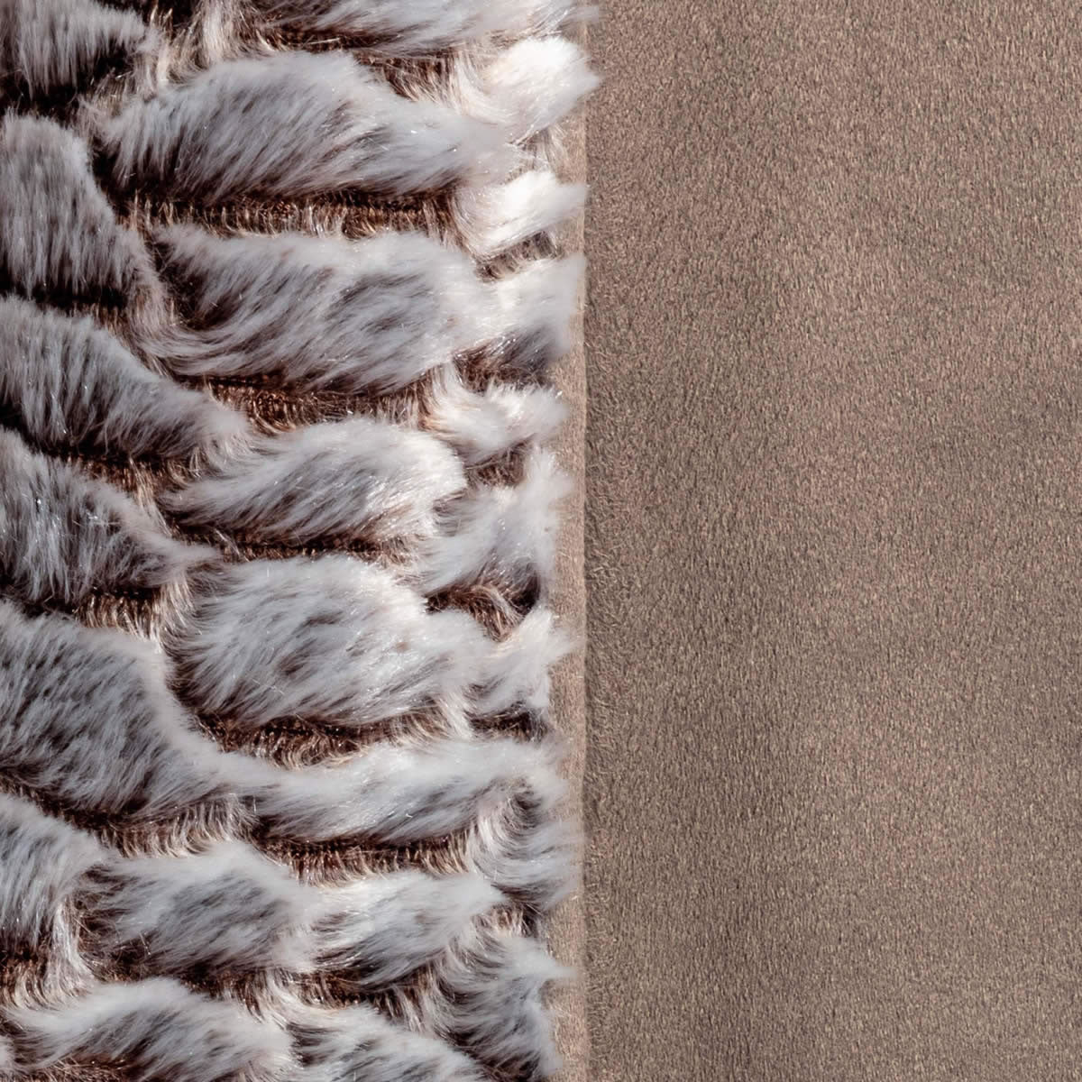 Danish Design Arctic Box Duvet Dog Bed shows a close up of the faux suede and fleece fabric