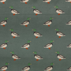 Danish Design Puddlewick Deep Duvet Dog Bed showing a close up of the a duck print design on a smoky green background