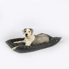 Danish Design Sherpa Fleece Charcoal Arrows Duvet Dog Bed with dog