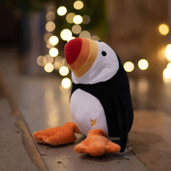 Petface Pana Puffin Plush Dog Toy with Loights in the background